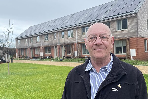 Dave Bolwell wearing a black zipped jacket and blue shirt at the Hazelmead Estate in Bridport