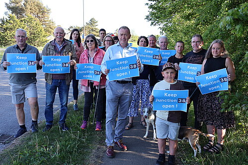 Tim with local residents at J38