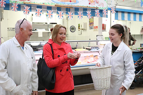 Helen talking to market traders in Market Drayton